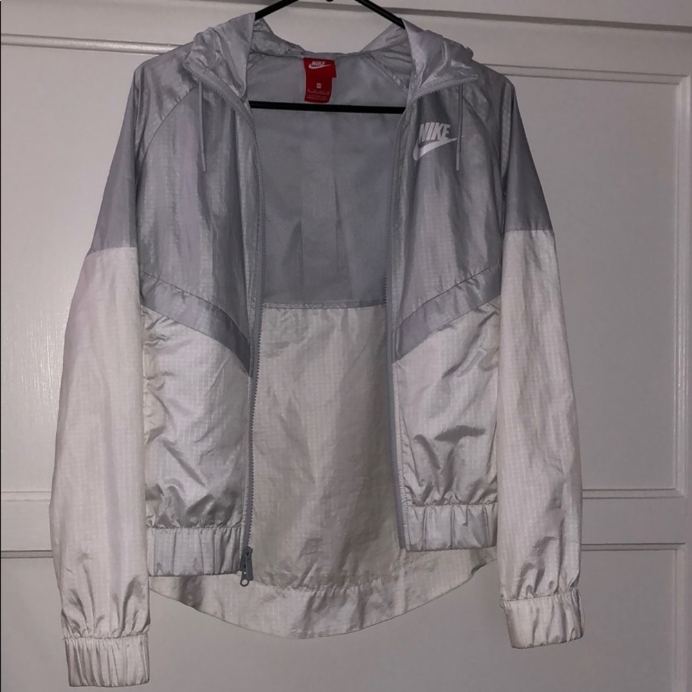 White and grey Nike windbreaker